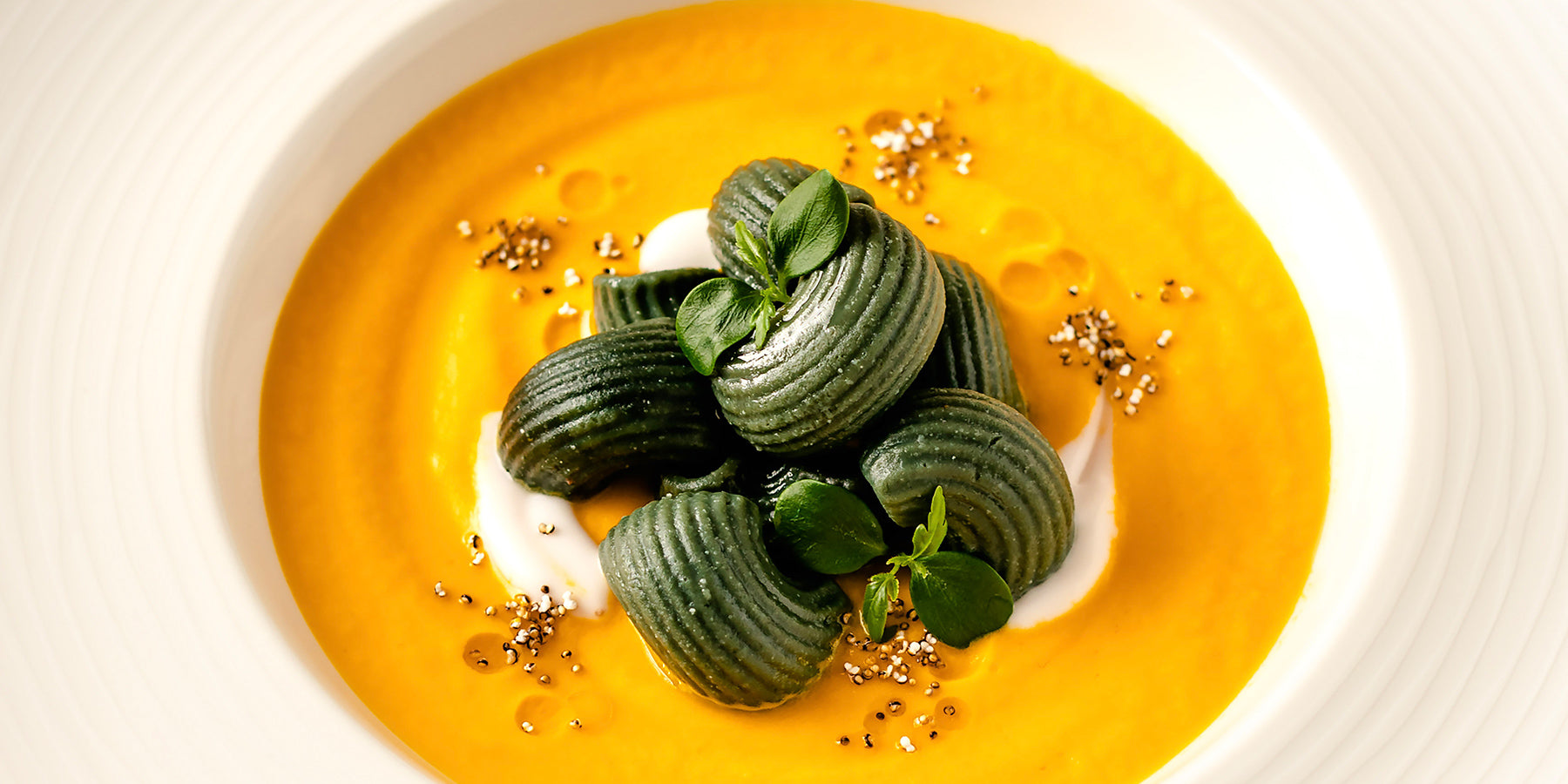 Creamy Carrot Soup with Spirulina Pipe Rigate and Puffed Amaranth